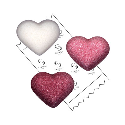 Individually wrapped pink and white heart-shaped sugars
