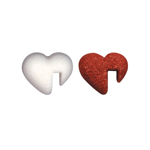 White and red heart-shaped sugar to hang on the rim of a cup